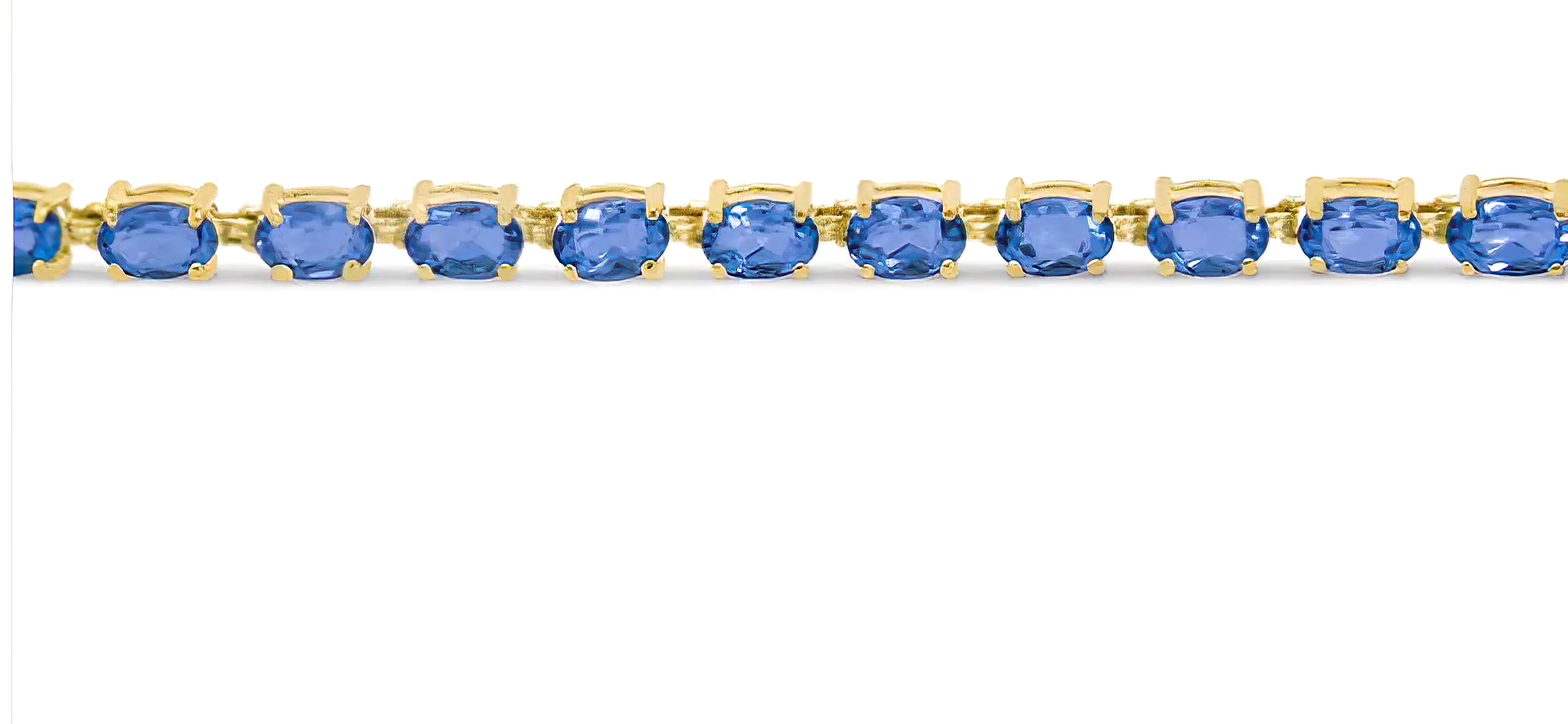 10K Yellow Gold and 4 Prong Set 6X4 MM Blue Topaz Link Tennis Bracelet - Size 7 Inches