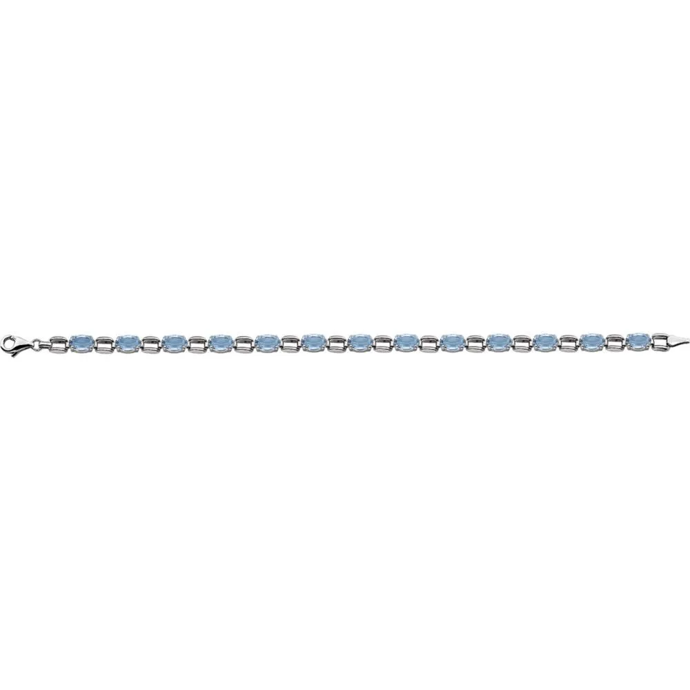 14k White Gold 7x5mm Oval Sky Blue Topaz 7" Bracelet