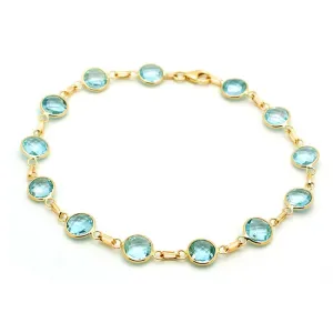 14k Yellow Swiss Blue Topaz Stationary Bracelet (16.25.cts.tw)
