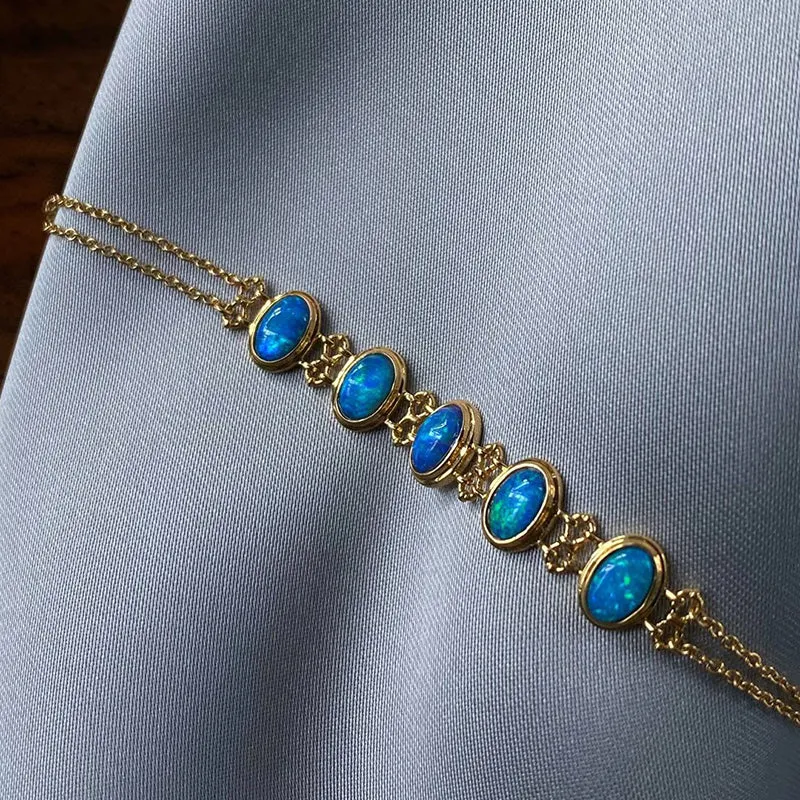 18K Gold Oval Cut 0.35ct Natural Opal Bolo Bracelet
