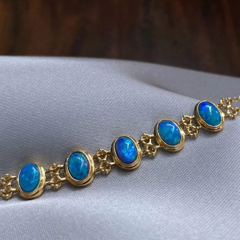 18K Gold Oval Cut 0.35ct Natural Opal Bolo Bracelet