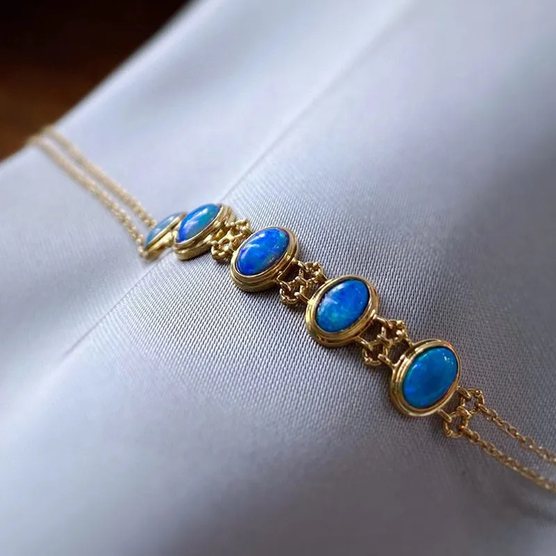 18K Gold Oval Cut 0.35ct Natural Opal Bolo Bracelet