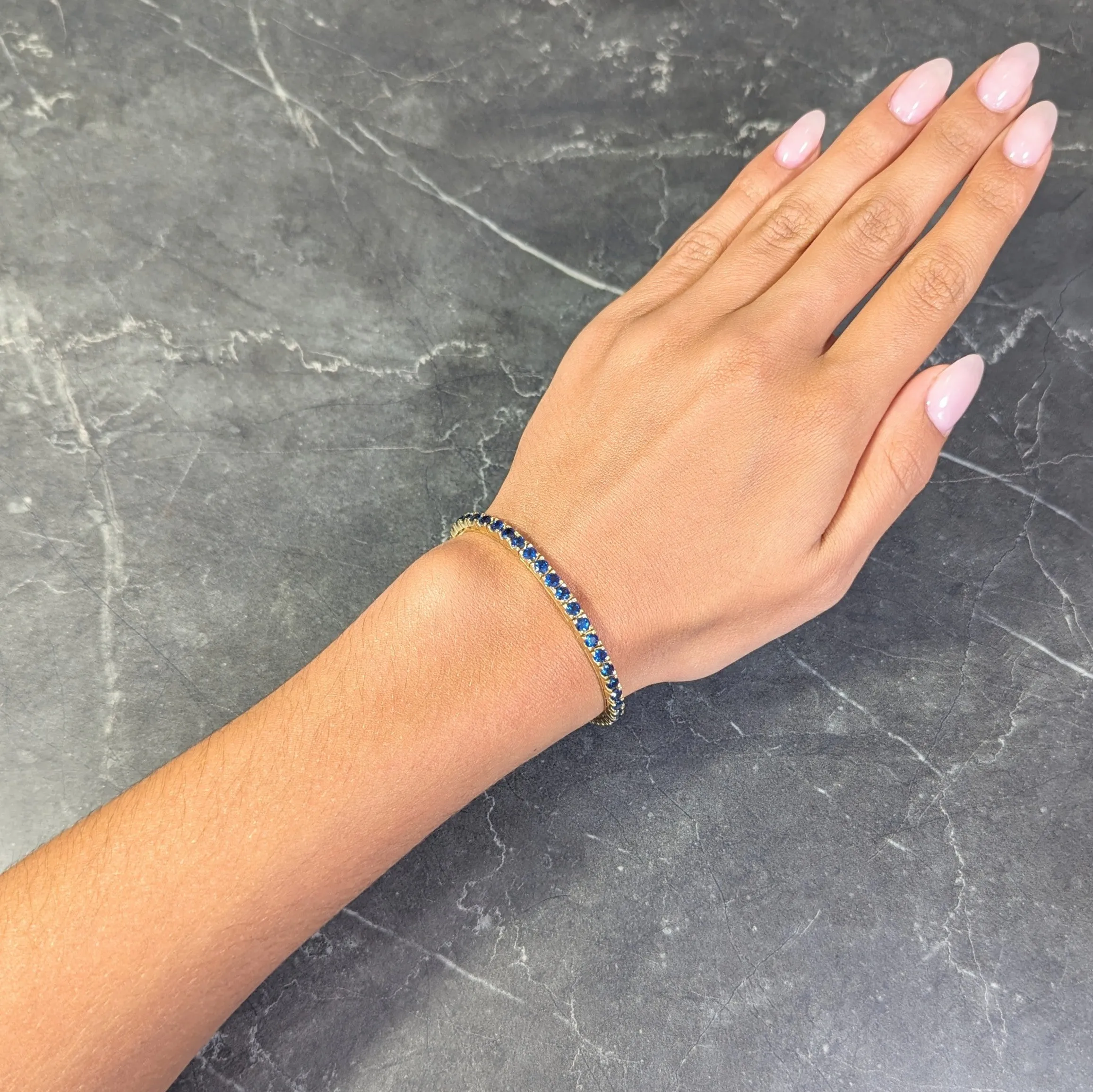 1990's 6.90 CTW Sapphire 18 Karat Yellow Gold Vintage Line Bracelet