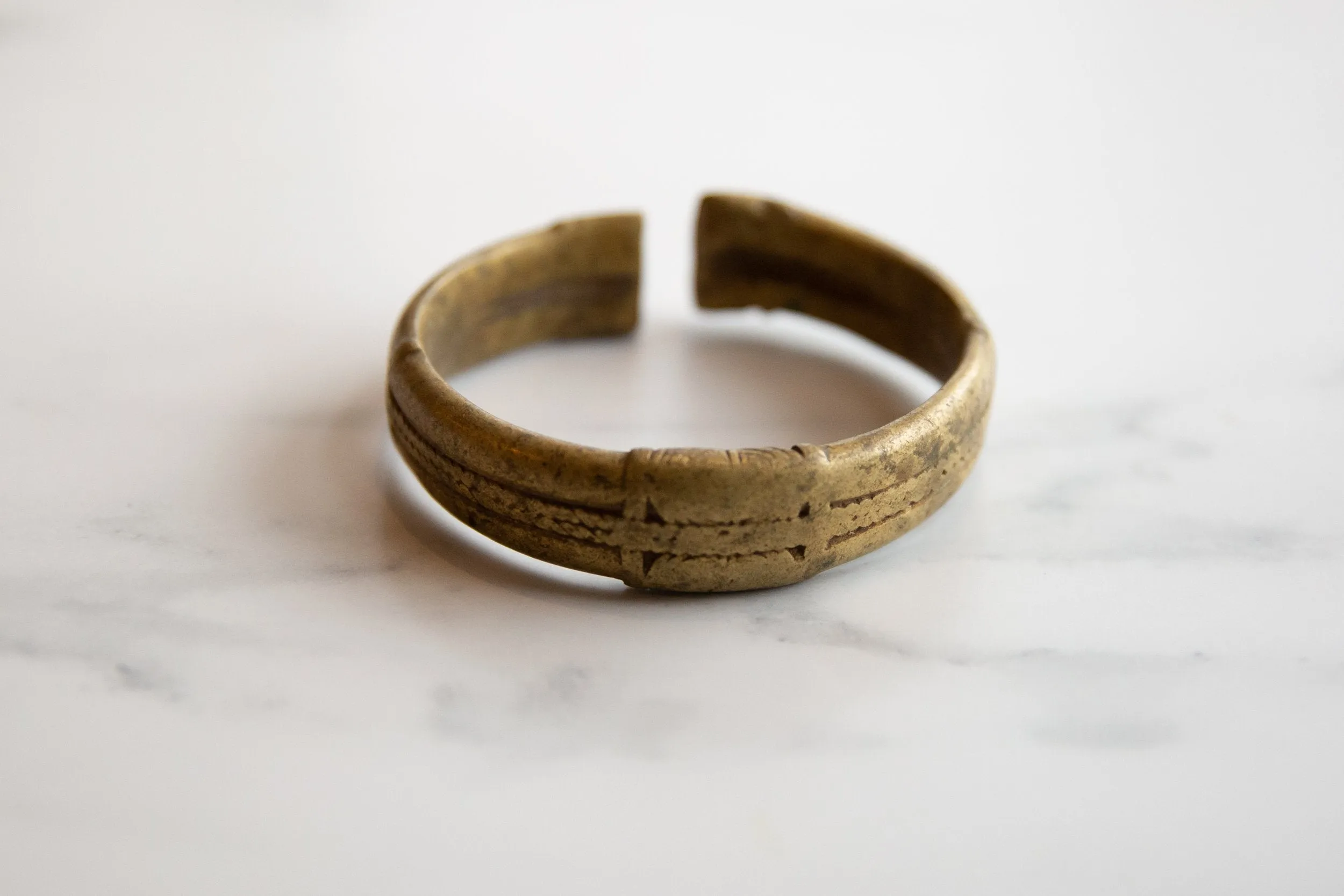 Antique African Bronze Stripe Design Cuff Bracelet with Golden Patina