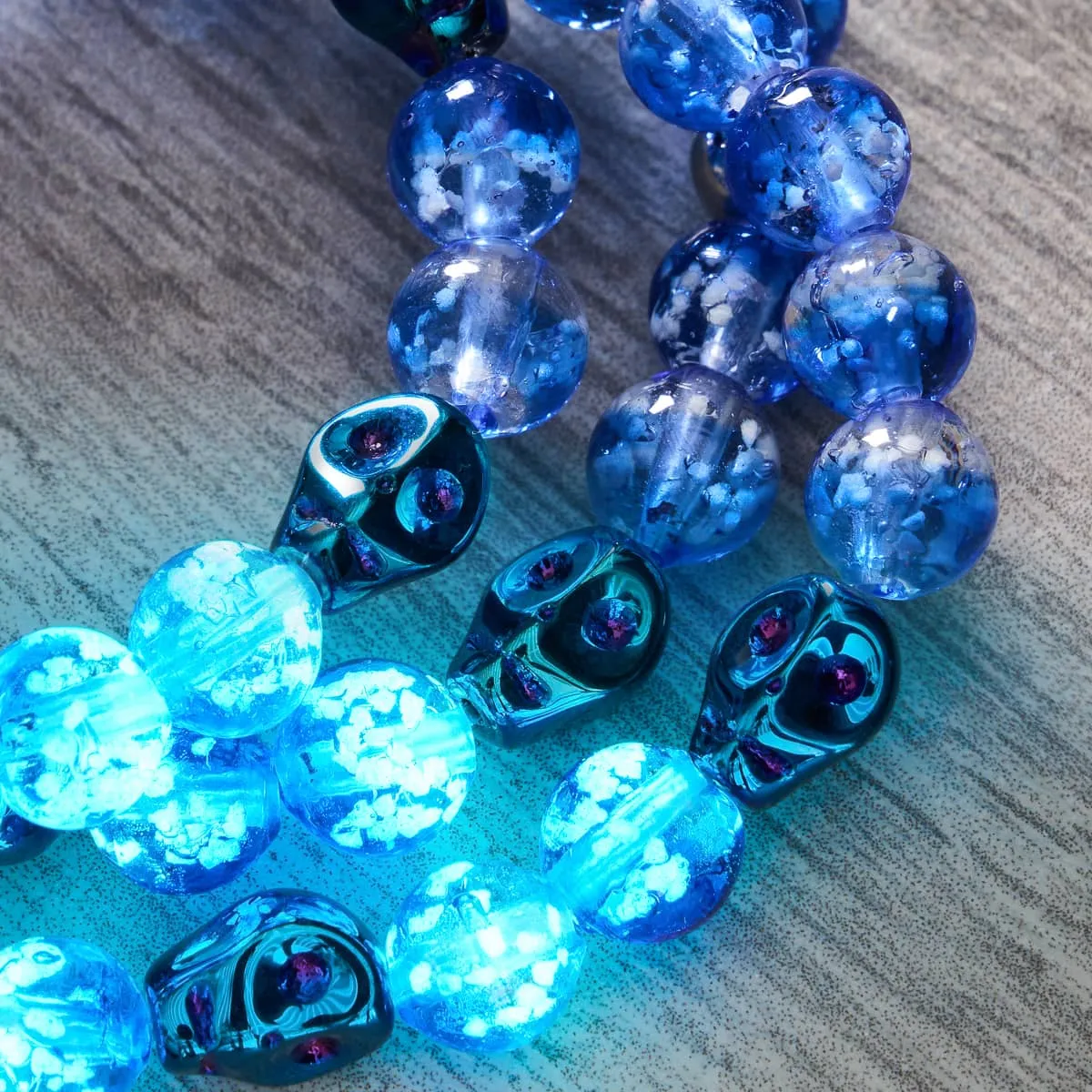 Eerie Tides | .925 Sterling Silver | Firefly Glass Skull Bracelet