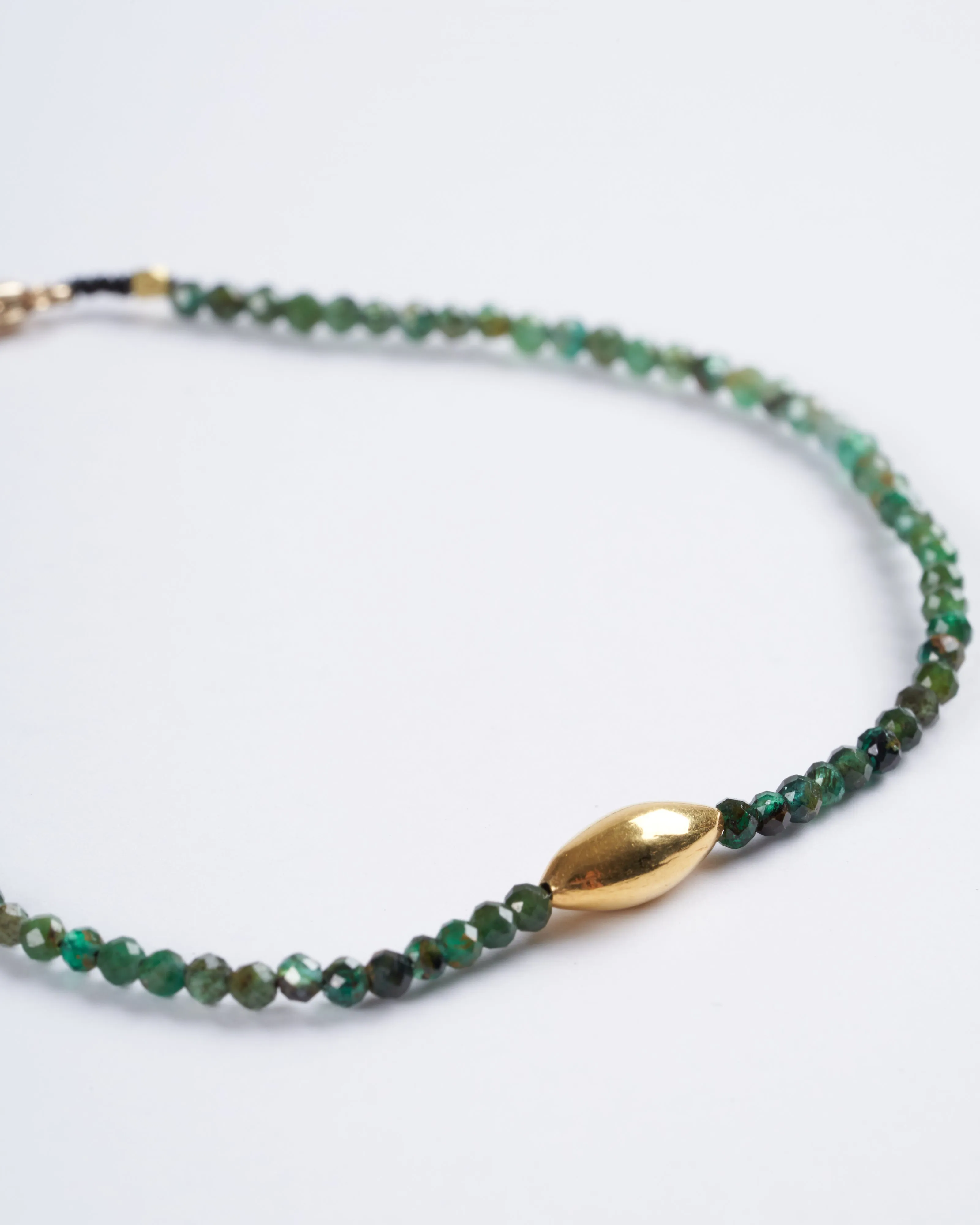 emerald and 18k gold bracelet