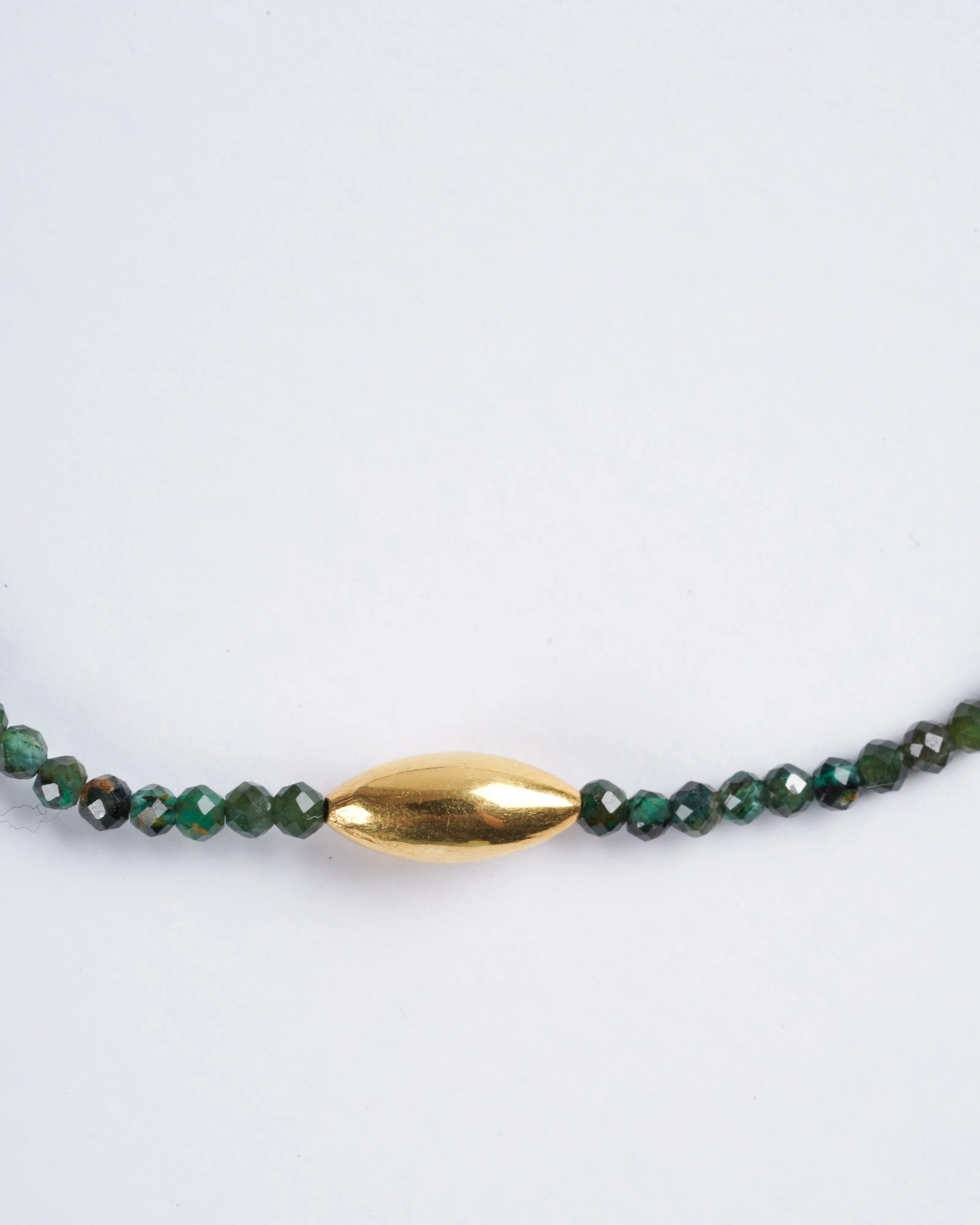 emerald and 18k gold bracelet