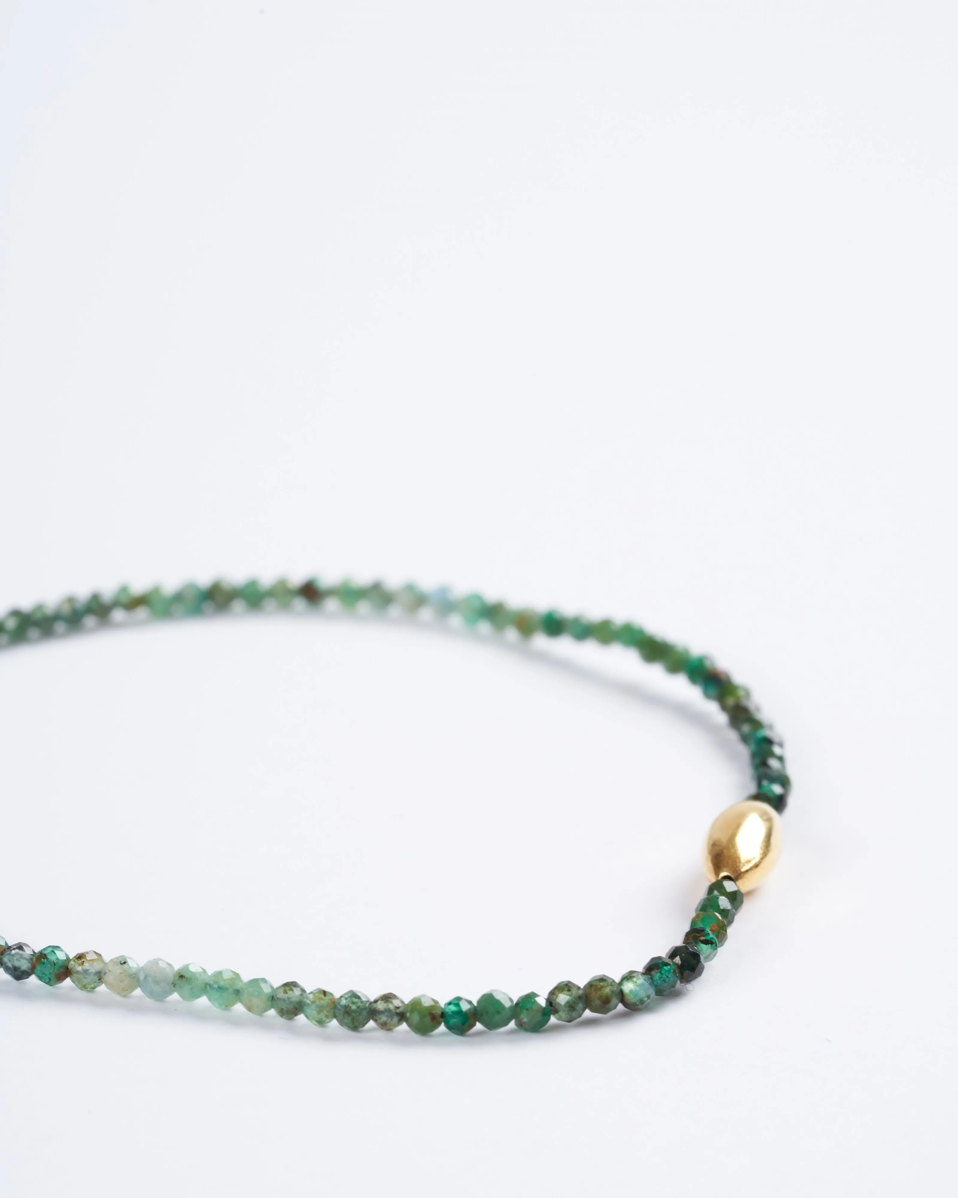 emerald and 18k gold bracelet