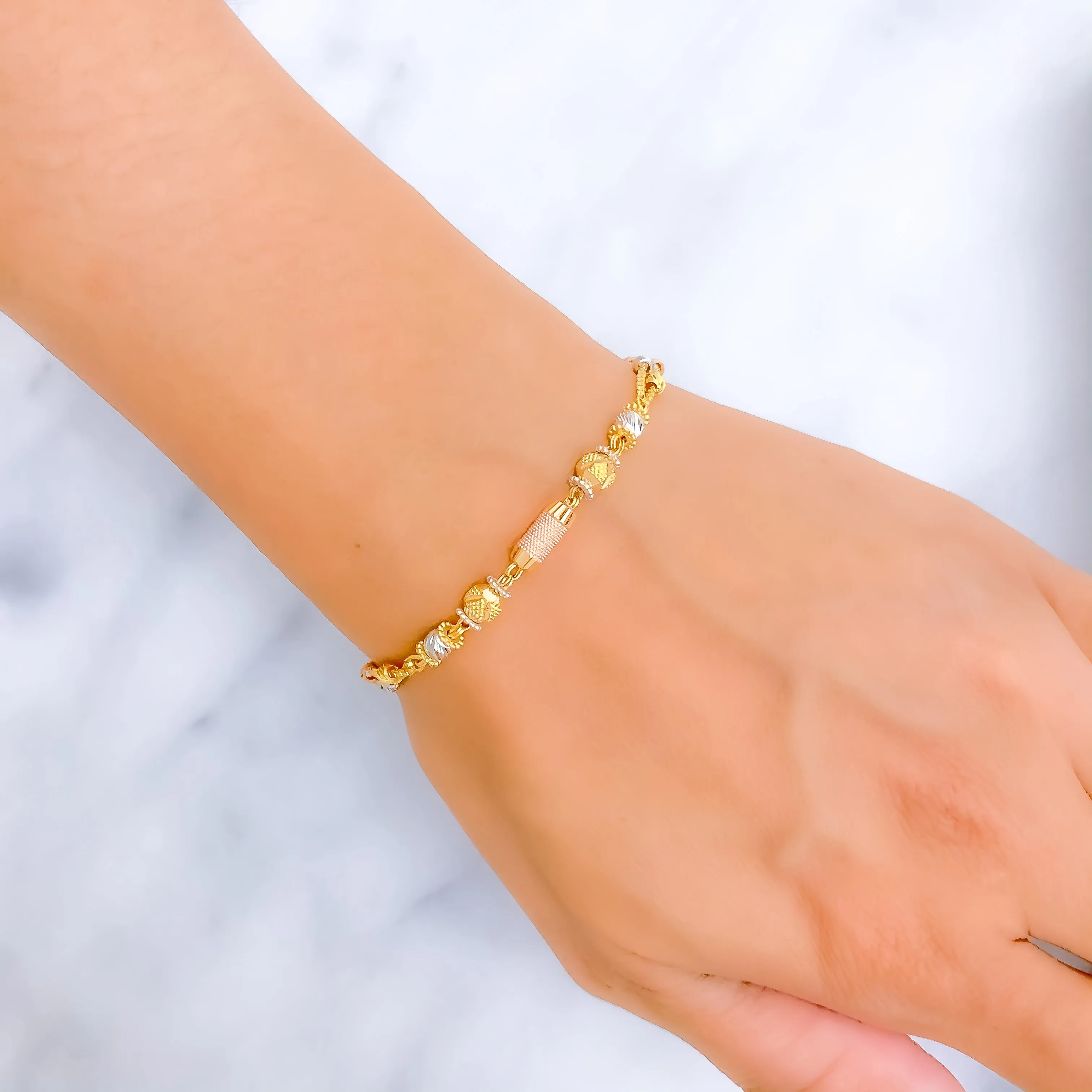 High-Gloss Ornamental 22k Gold Orb Bracelet