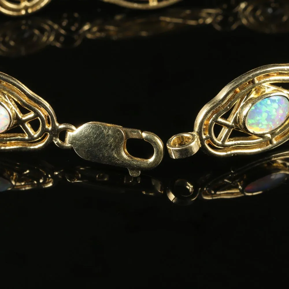 Opal Blue Topaz Bracelet 9Ct Yellow Gold