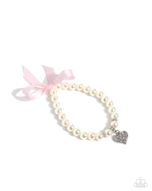 Prim and Pretty - Pink - Bow Iridescent Pearl Silver Heart Charm Paparazzi Stretchy Bracelet - 2024 Empower Me Pink Exclusive
