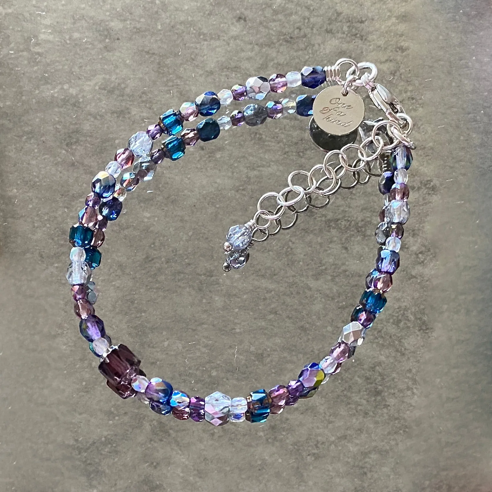 "Royal Plumes" Brilliant Lights Glass Collection Adjustable Strung Bracelet by Arpaia in Sterling Silver with Czech Glass