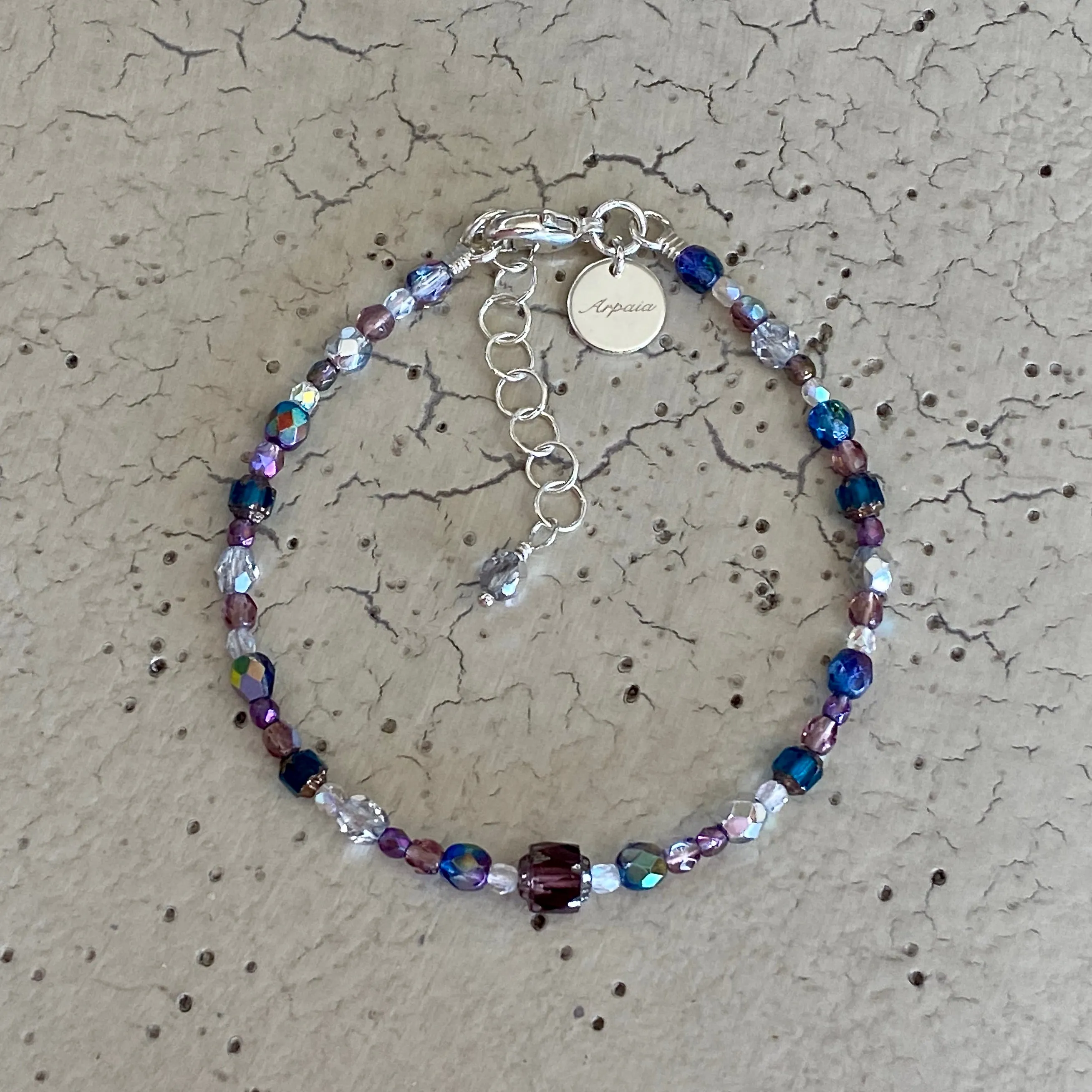 "Royal Plumes" Brilliant Lights Glass Collection Adjustable Strung Bracelet by Arpaia in Sterling Silver with Czech Glass