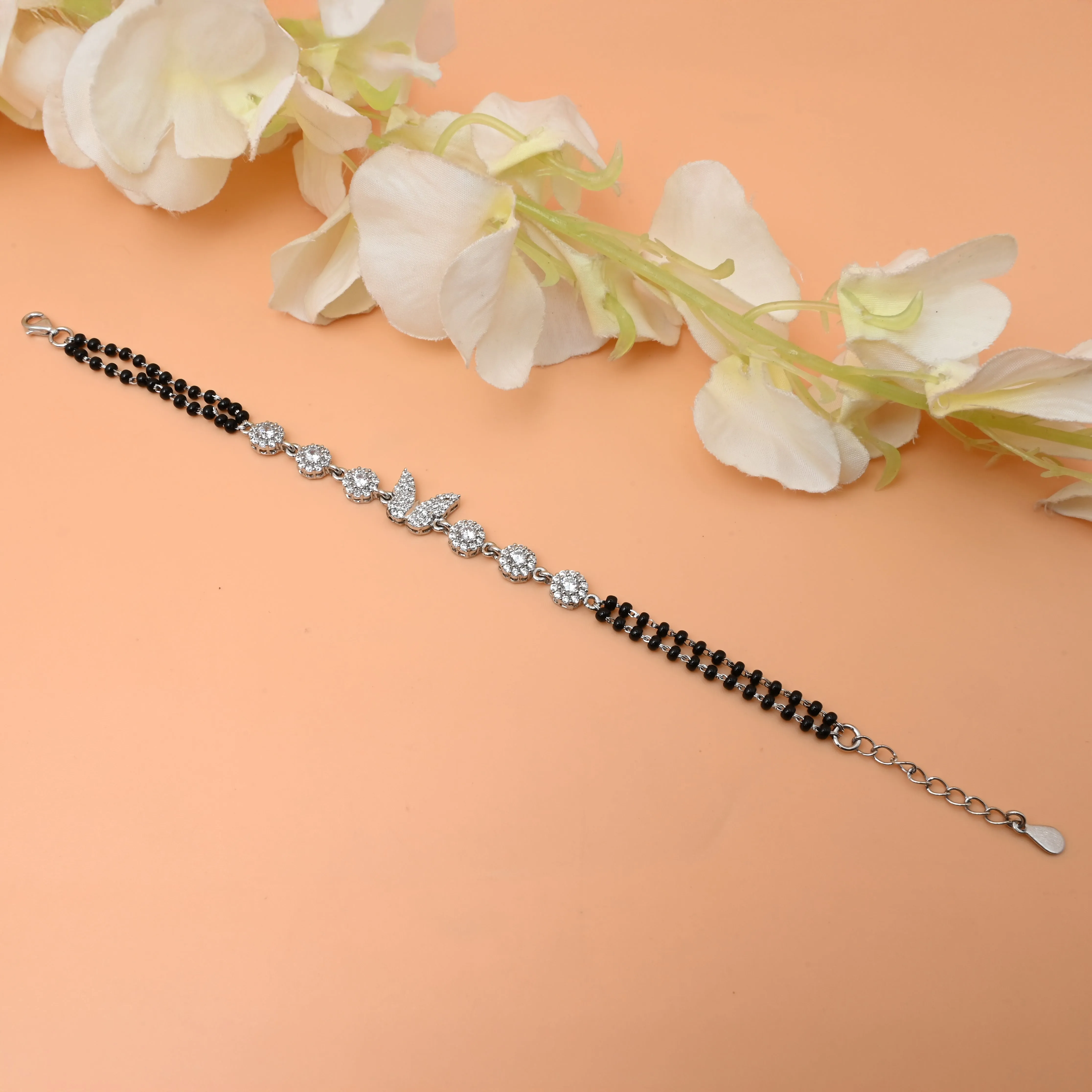 Silver Bracelet with Butterfly Bud and White Stones – Mangalsutra Design