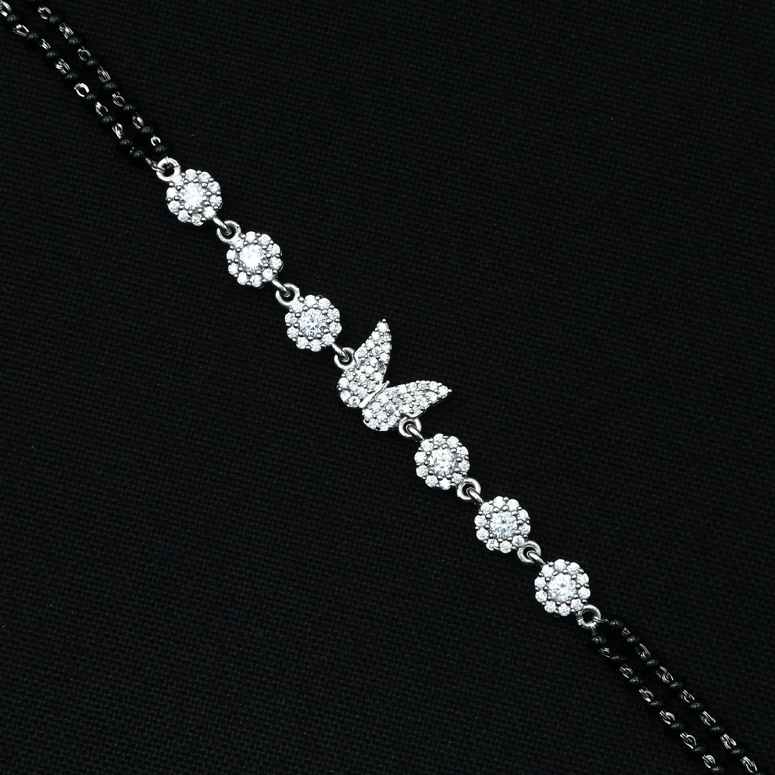 Silver Bracelet with Butterfly Bud and White Stones – Mangalsutra Design