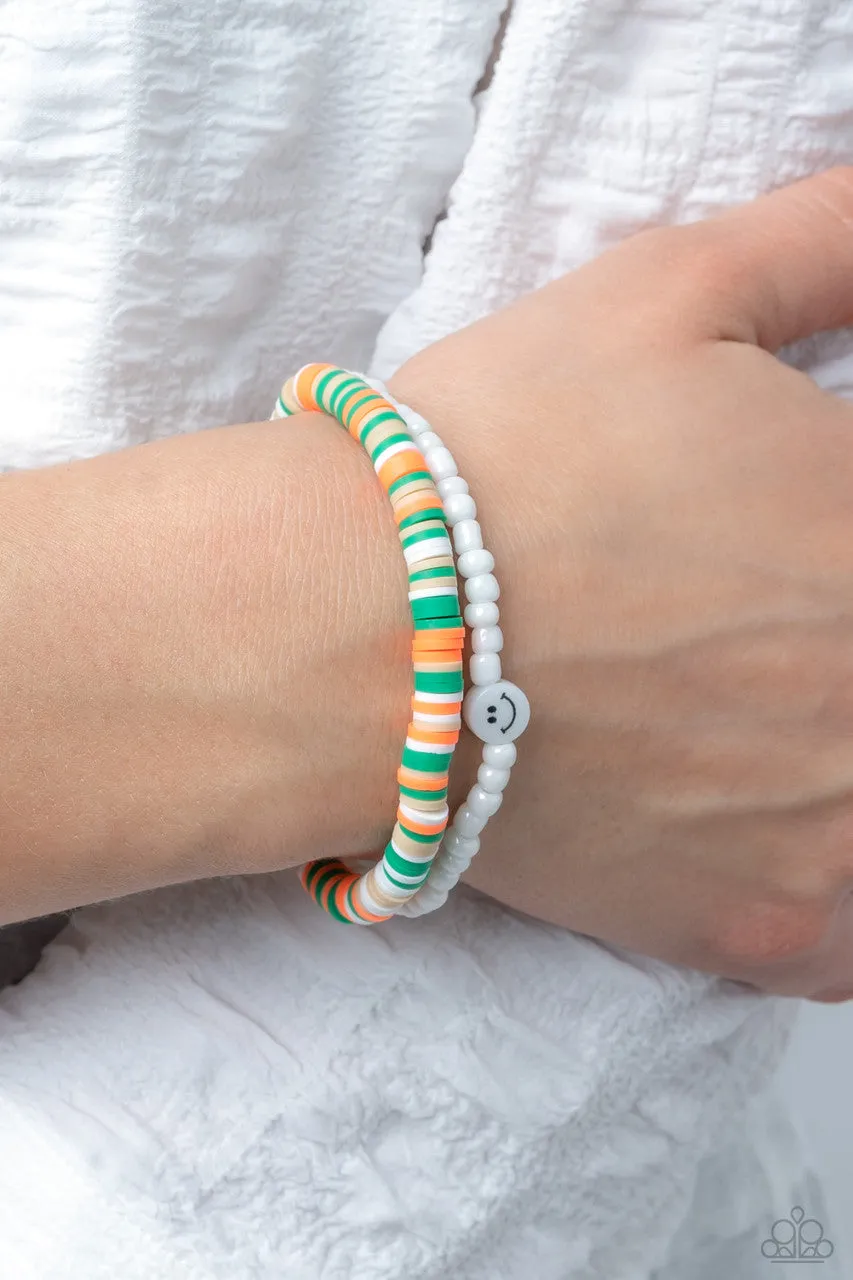 Tabloid Talent - Green - Colorful Clay Discs, Seed Bead, and Smiley Face Paparazzi Stretchy Bracelet